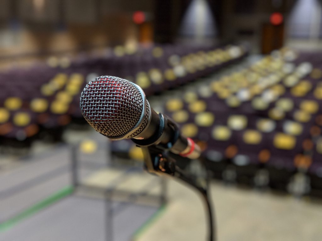 Photo of microphone in auditorium