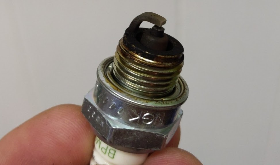Photo of a dirty spark plug